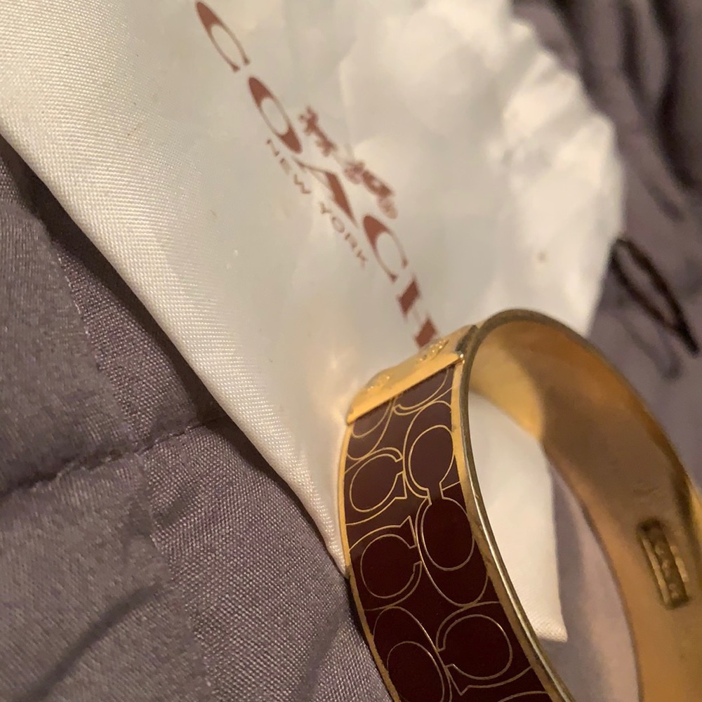 Brand new Coach Bangle with pouch